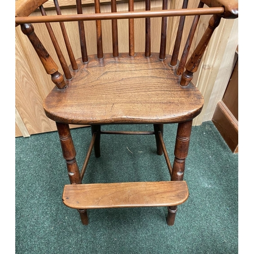 256 - A 19TH CENTURY HARDWOOD CHILDREN’S HIGHCHAIR, c.1820. Winsor style chair, with hoop back and spindle... 