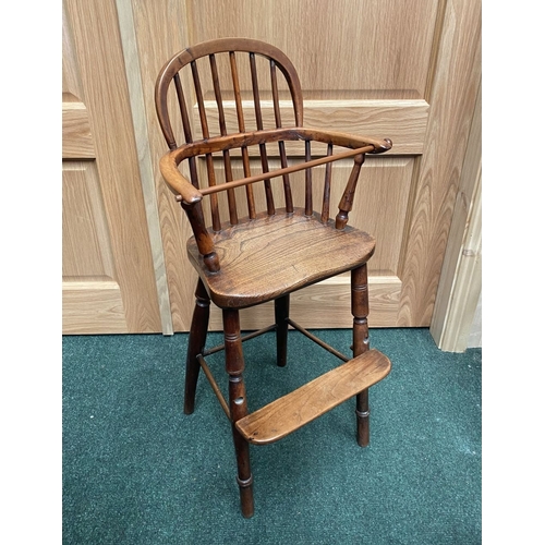 256 - A 19TH CENTURY HARDWOOD CHILDREN’S HIGHCHAIR, c.1820. Winsor style chair, with hoop back and spindle... 