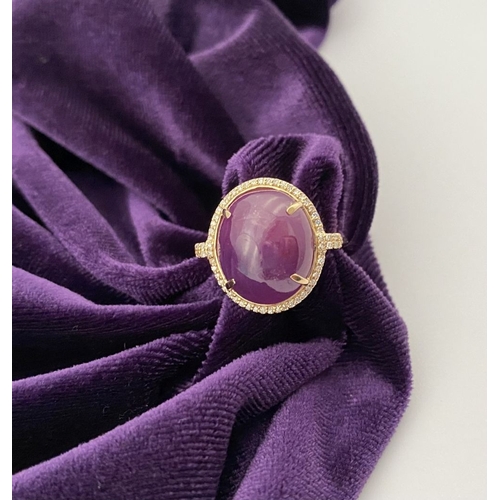 35 - A STRIKING 14CT YELLOW GOLD OVAL CABOCHON RUBY & DIAMOND CLUSTER RING, with central oval cabochon cu... 