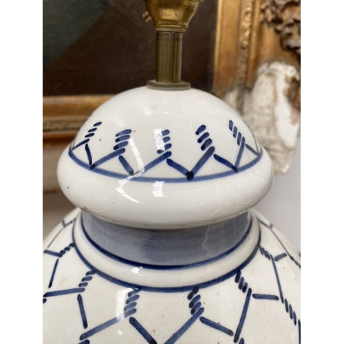 37 - A PAIR OF 19TH CENTURY ITALIAN HAND-PAINTED CERAMIC TABLE LAMPS, ginger jar form with geometric patt... 