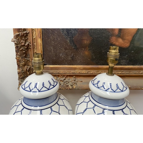 37 - A PAIR OF 19TH CENTURY ITALIAN HAND-PAINTED CERAMIC TABLE LAMPS, ginger jar form with geometric patt... 