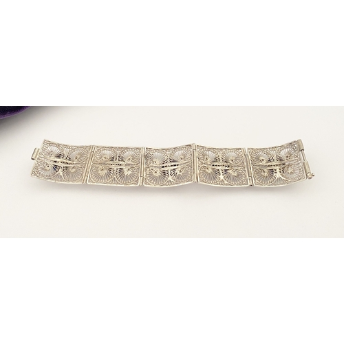 47 - A VICTORIAN FILIGREE SILVER BRACELET WITH LAPIS LAZULI CABOCHONS, with five oval lapis lazuli caboch... 