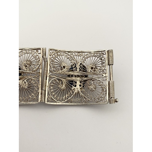 47 - A VICTORIAN FILIGREE SILVER BRACELET WITH LAPIS LAZULI CABOCHONS, with five oval lapis lazuli caboch... 