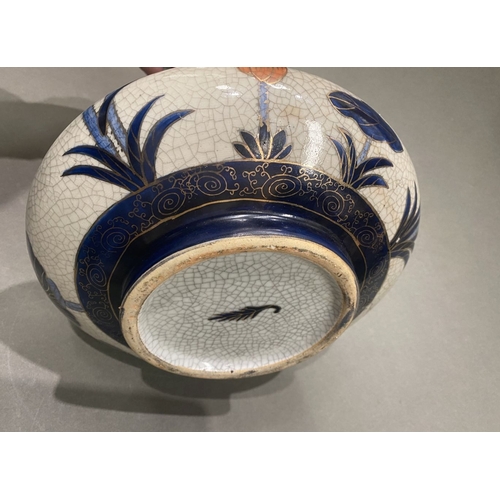 49 - AN ANTIQUE CHINESE CRACKLE GLAZED VASE, with flared rim, long concave neck and bulbous body, raised ... 
