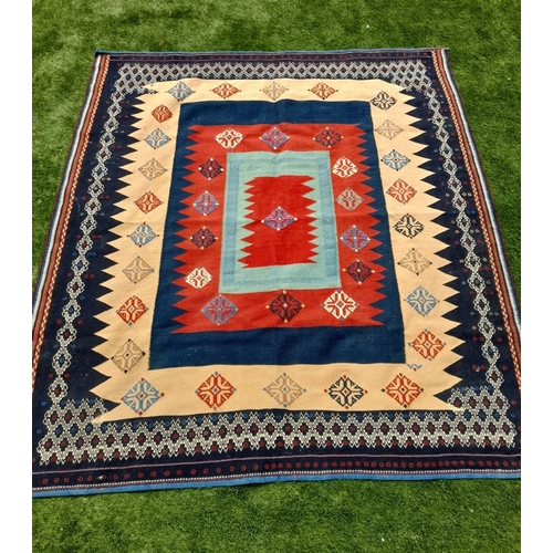 55 - A VIBRANT TURKISH KILIM RUG, hand knotted, dyed using natural vegetable dyes, high knot density. In ... 