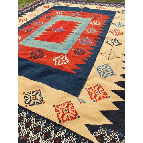 55 - A VIBRANT TURKISH KILIM RUG, hand knotted, dyed using natural vegetable dyes, high knot density. In ... 