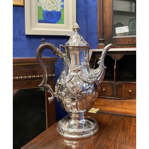 6 - AN EXCEPTIONAL GEORGE III IRISH SILVER COFFEE POT, Hallmarked with Makers mark Charles Townsend, Ski... 