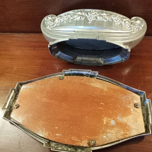 126 - AN ART DECO WHITE METAL JARDINIÈRE CENTREPIECE, with two handles and foliate design to exterior, com... 