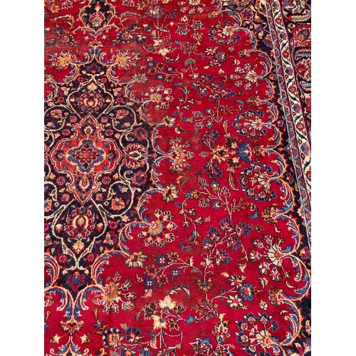 127 - A VIBRANT PERSIAN KASHAN RUG, hand knotted, high knot density, dyed using natural vegetable dyes. In... 