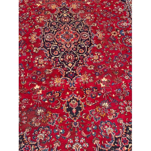 127 - A VIBRANT PERSIAN KASHAN RUG, hand knotted, high knot density, dyed using natural vegetable dyes. In... 