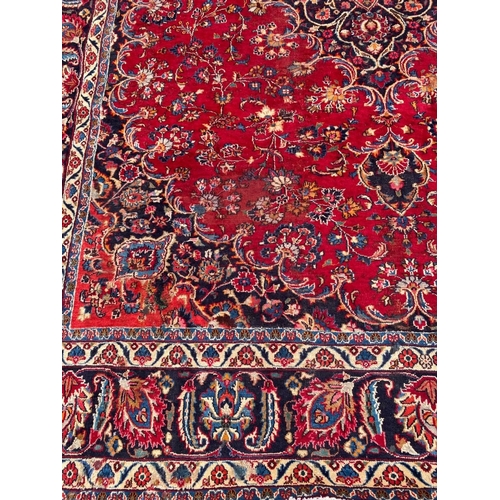 127 - A VIBRANT PERSIAN KASHAN RUG, hand knotted, high knot density, dyed using natural vegetable dyes. In... 