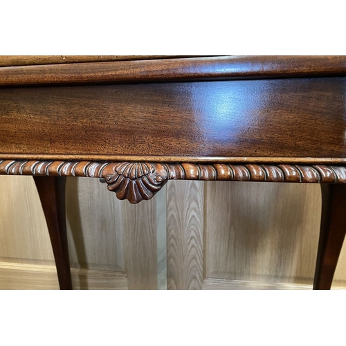 62 - AN EXCELLENT QUALITY CHIPPENDALE STYLE MAHOGANY TEA TABLE, with shaped inlaid fold-over top, above f... 