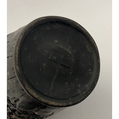 91 - A CHINESE CARVED BLACK CINNABAR LACQUER VASE, the body decorated with incised dragon and smoke motif... 