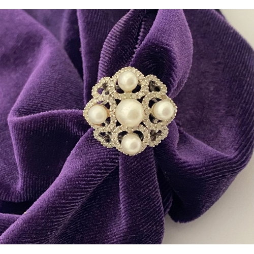 20 - AN ORNATE 9CT WHITE GOLD PEARL & DIAMOND STATEMENT RING, featuring five pearls on white gold setting... 