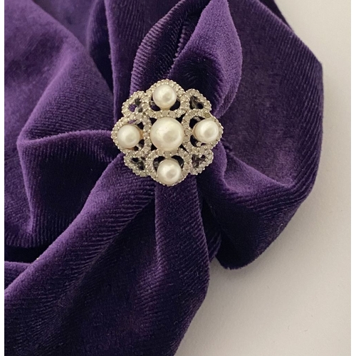 20 - AN ORNATE 9CT WHITE GOLD PEARL & DIAMOND STATEMENT RING, featuring five pearls on white gold setting... 