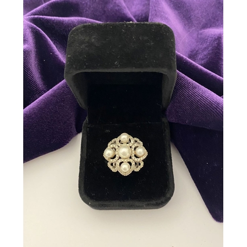 20 - AN ORNATE 9CT WHITE GOLD PEARL & DIAMOND STATEMENT RING, featuring five pearls on white gold setting... 