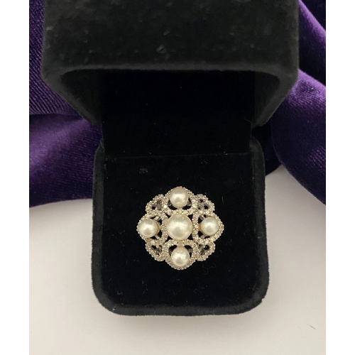 20 - AN ORNATE 9CT WHITE GOLD PEARL & DIAMOND STATEMENT RING, featuring five pearls on white gold setting... 
