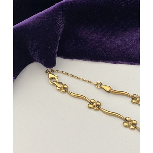 25 - A BEAUTIFUL 9CT GOLD NECKLACE & BRACELET, both with matching foliate design and long waving links, h... 