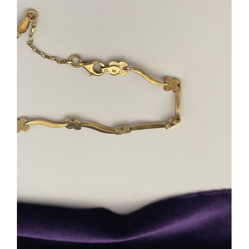 25 - A BEAUTIFUL 9CT GOLD NECKLACE & BRACELET, both with matching foliate design and long waving links, h... 