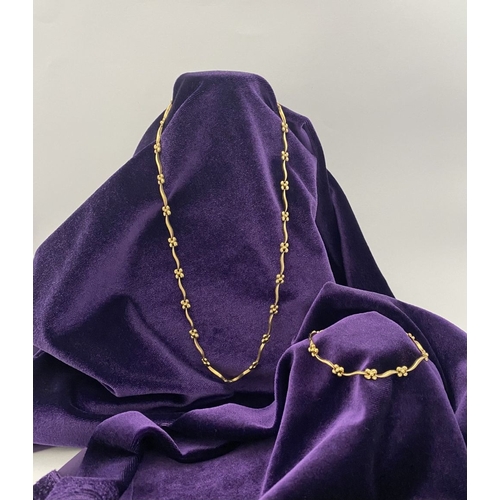 25 - A BEAUTIFUL 9CT GOLD NECKLACE & BRACELET, both with matching foliate design and long waving links, h... 