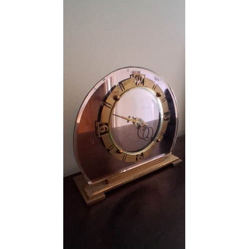 A LARGE ART DECO COPPER, BRASS & GLASS MANTLE CLOCK, by Temco, England ...