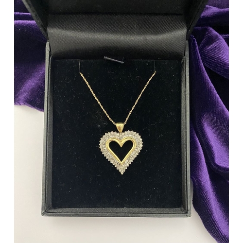 31 - A STUNNING 10CT YELLOW GOLD WHITE SAPPHIRE HEART PENDANT NECKLACE, the heart shaped pendant set with... 