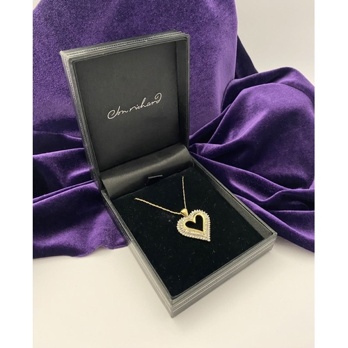 31 - A STUNNING 10CT YELLOW GOLD WHITE SAPPHIRE HEART PENDANT NECKLACE, the heart shaped pendant set with... 