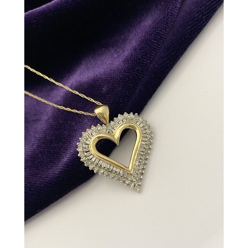 31 - A STUNNING 10CT YELLOW GOLD WHITE SAPPHIRE HEART PENDANT NECKLACE, the heart shaped pendant set with... 