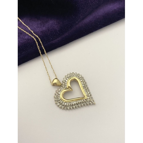 31 - A STUNNING 10CT YELLOW GOLD WHITE SAPPHIRE HEART PENDANT NECKLACE, the heart shaped pendant set with... 