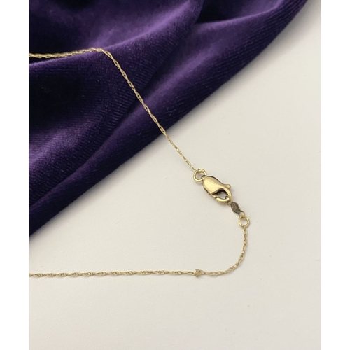 31 - A STUNNING 10CT YELLOW GOLD WHITE SAPPHIRE HEART PENDANT NECKLACE, the heart shaped pendant set with... 