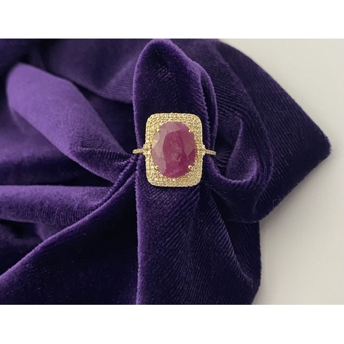 4 - A MAGNIFICENT 14CT GOLD RUBY & DIAMOND STATEMENT RING, with central 6.65ct oval mixed cut ruby, claw... 