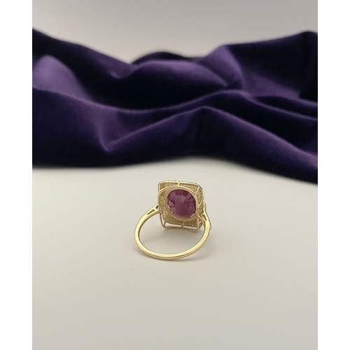 4 - A MAGNIFICENT 14CT GOLD RUBY & DIAMOND STATEMENT RING, with central 6.65ct oval mixed cut ruby, claw... 