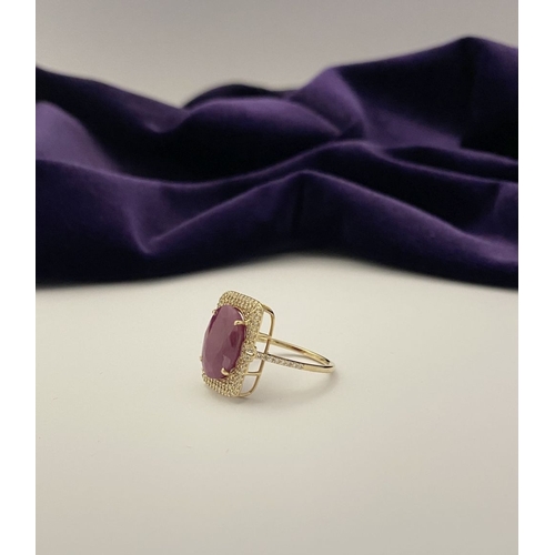 4 - A MAGNIFICENT 14CT GOLD RUBY & DIAMOND STATEMENT RING, with central 6.65ct oval mixed cut ruby, claw... 