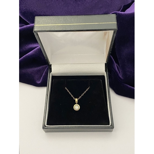 44 - AN ELEGANT 9CT YELLOW GOLD DIAMOND SOLITAIRE PENDANT NECKLACE, featuring beautiful round cut diamond... 