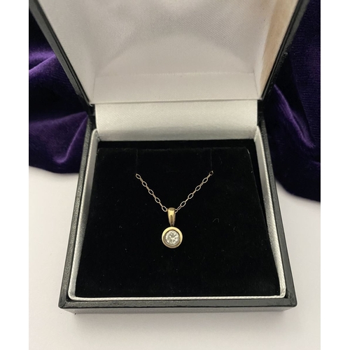 44 - AN ELEGANT 9CT YELLOW GOLD DIAMOND SOLITAIRE PENDANT NECKLACE, featuring beautiful round cut diamond... 