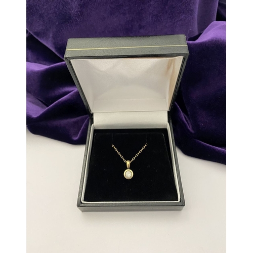 44 - AN ELEGANT 9CT YELLOW GOLD DIAMOND SOLITAIRE PENDANT NECKLACE, featuring beautiful round cut diamond... 