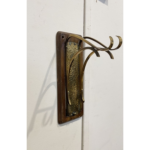 46 - A BRASS WALL HANGING DINNER GONG, wall mountable hardwood stand, with brass hanging hooks and hammer... 