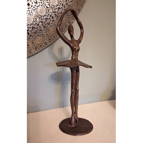 52 - A MODERN SCULPTURE IN THE FORM OF BALLERINA, abstracted form, in bronze tone metal, on circular base... 