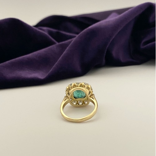 9 - AN EXCEPTIONAL 18CT GOLD EMERALD & DIAMOND CLUSTER RING, with central vibrant emerald in bezel setti... 