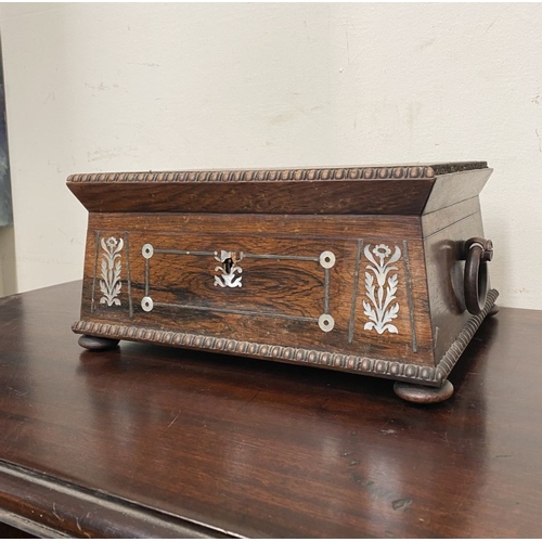 133 - AN ANTIQUE VICTORIAN ROSEWOOD MOTHER OF PEARL INLAID SEWING BOX, the sarcophagus shaped box is highl... 