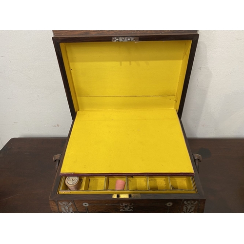 133 - AN ANTIQUE VICTORIAN ROSEWOOD MOTHER OF PEARL INLAID SEWING BOX, the sarcophagus shaped box is highl... 