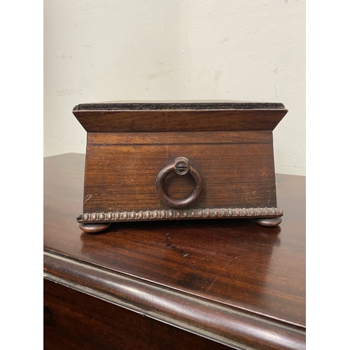133 - AN ANTIQUE VICTORIAN ROSEWOOD MOTHER OF PEARL INLAID SEWING BOX, the sarcophagus shaped box is highl... 