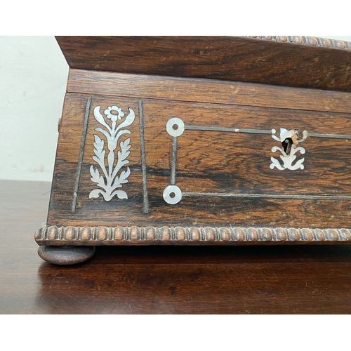 133 - AN ANTIQUE VICTORIAN ROSEWOOD MOTHER OF PEARL INLAID SEWING BOX, the sarcophagus shaped box is highl... 