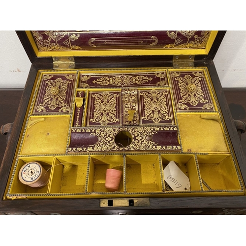 133 - AN ANTIQUE VICTORIAN ROSEWOOD MOTHER OF PEARL INLAID SEWING BOX, the sarcophagus shaped box is highl... 