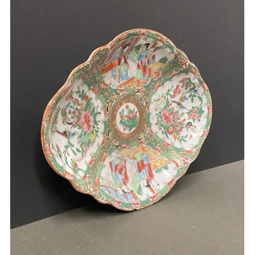 72 - A LATE 19TH CENTURY CHINESE CANTON FAMILLE ROSE SERVING PLATTER, c.1900, with scalloped rim on a low... 