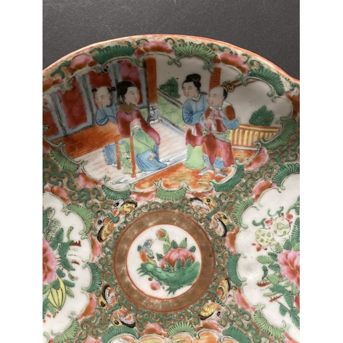 72 - A LATE 19TH CENTURY CHINESE CANTON FAMILLE ROSE SERVING PLATTER, c.1900, with scalloped rim on a low... 