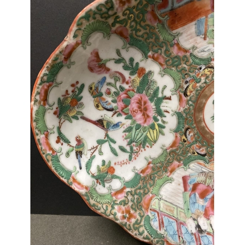 72 - A LATE 19TH CENTURY CHINESE CANTON FAMILLE ROSE SERVING PLATTER, c.1900, with scalloped rim on a low... 