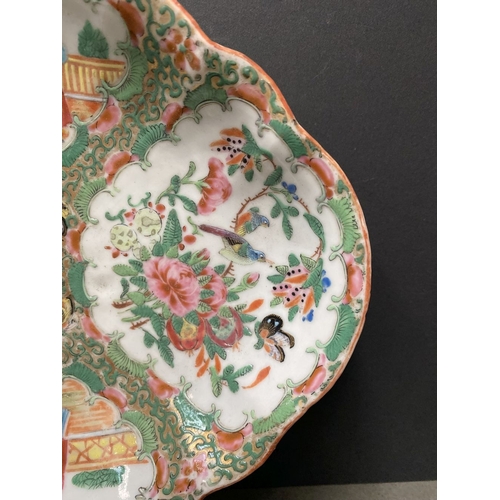 72 - A LATE 19TH CENTURY CHINESE CANTON FAMILLE ROSE SERVING PLATTER, c.1900, with scalloped rim on a low... 