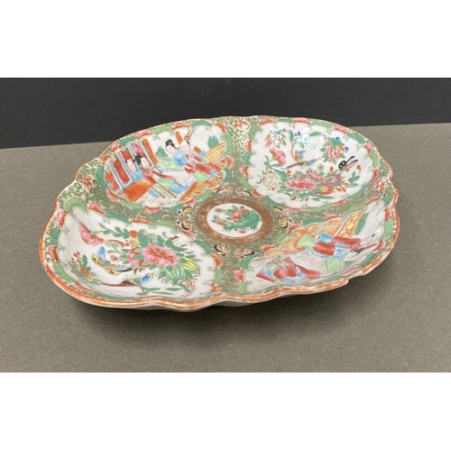 72 - A LATE 19TH CENTURY CHINESE CANTON FAMILLE ROSE SERVING PLATTER, c.1900, with scalloped rim on a low... 