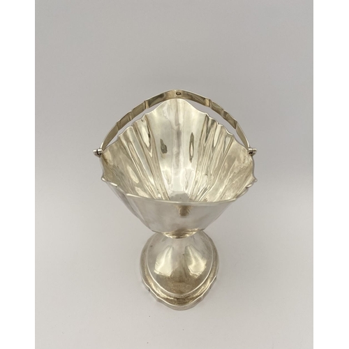 12 - A FINE GEORGE III IRISH SILVER HELMET SHAPED SUGAR BASKET, by Richard Sawyer, Dublin c.1798. The bod... 